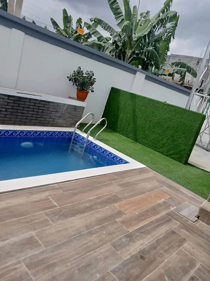 Completed outdoor pool and deck at the residence